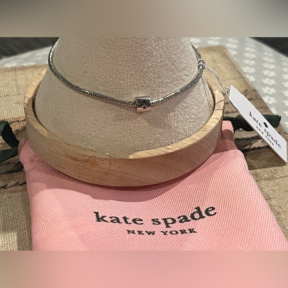 Kate Spade silver chain bracelet with spade charm NWT includes pink bag